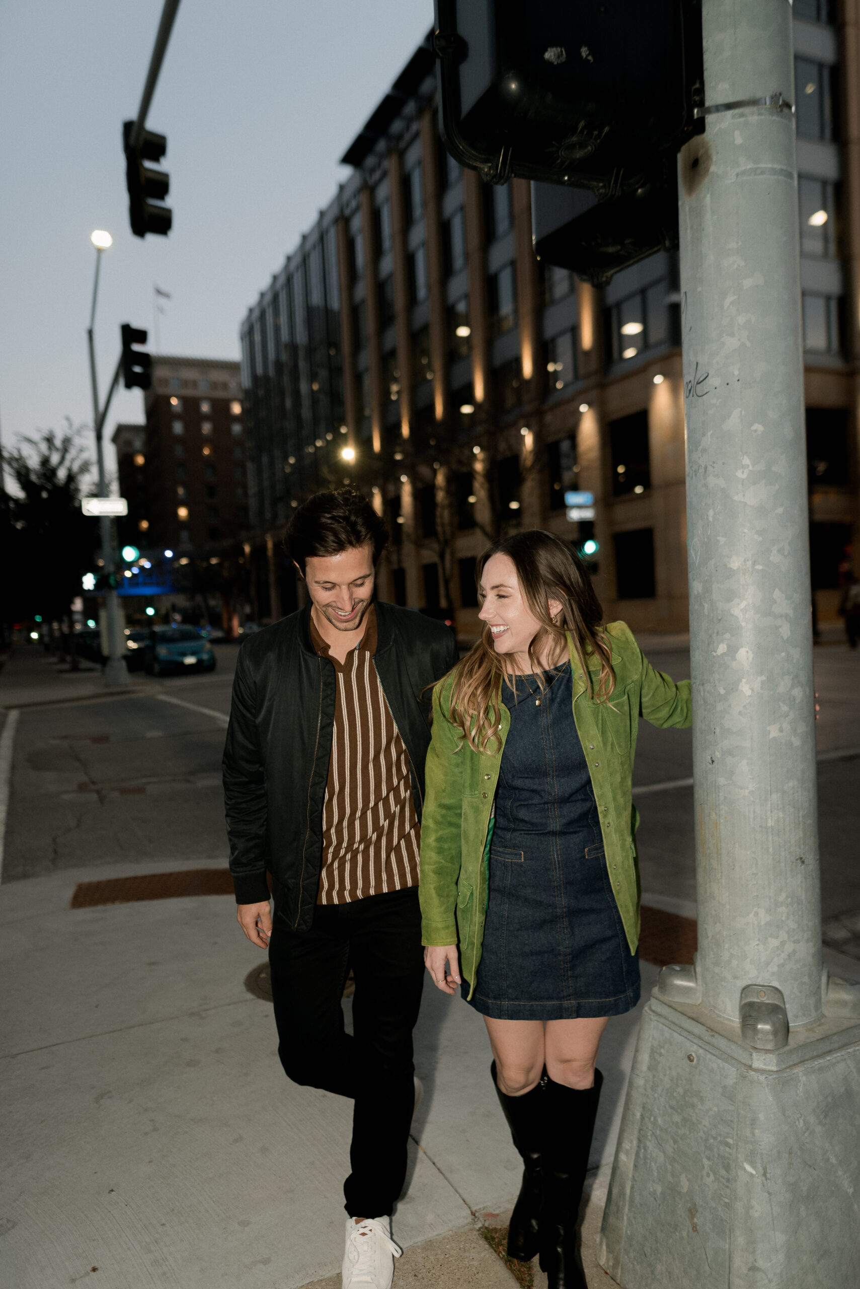 des moines engagement session in downtown with flash